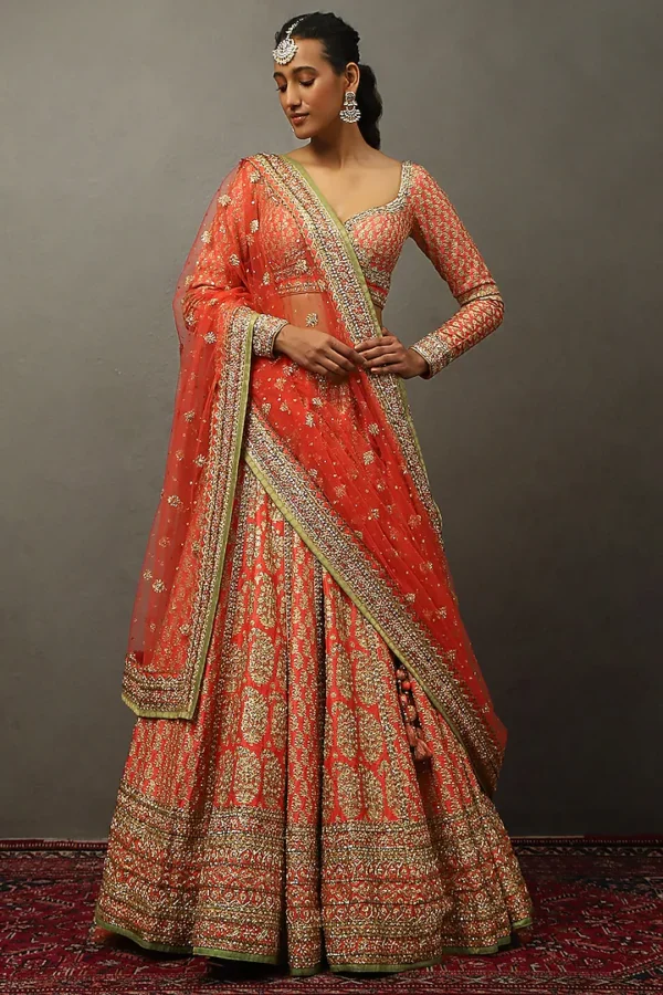 Radiant Orange Bridal Lehenga Choli with Intricate Embroidery – A Perfect Wedding Attire